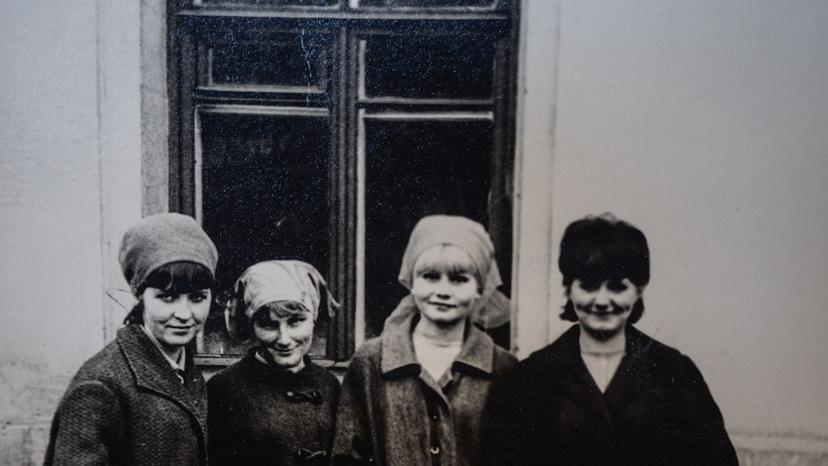a group of women standing next to each other